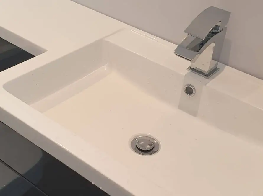 Finished bathroom refurbishment with walk-in shower, tiled walls and clean finish”